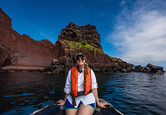 Woman on a panga ride in the Galapagos Islands