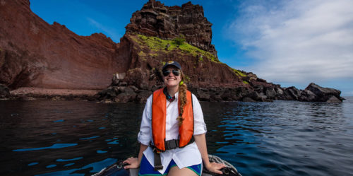 Woman on a panga ride in the Galapagos Islands