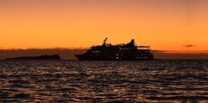 Santa Cruz II Galapagos Cruise sailing during sunset