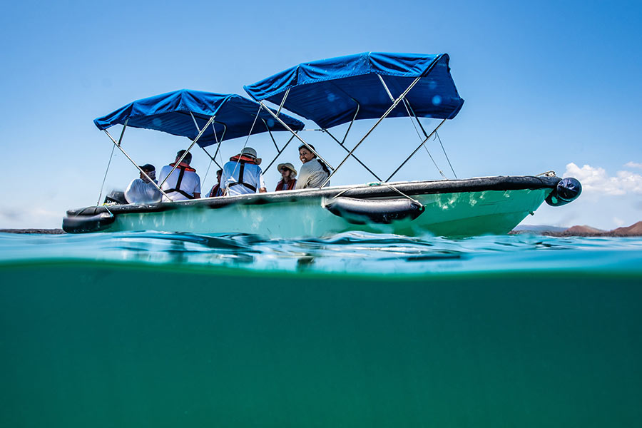 Glass-bottom boat ride sailing in Bartolome Island, Galapagos