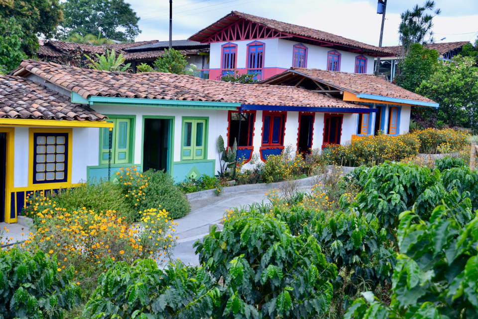 Traditional ceramic roofs and pastel-colored houses in Armenia, Colombia